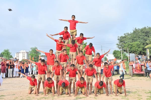 A human pyramid by the brahmacharis
