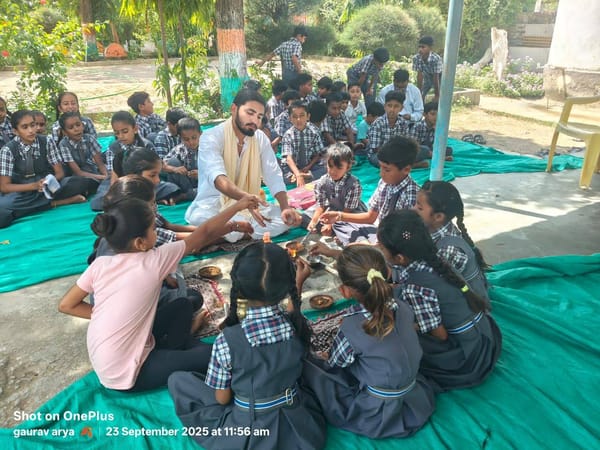 With visiting schoolchildren